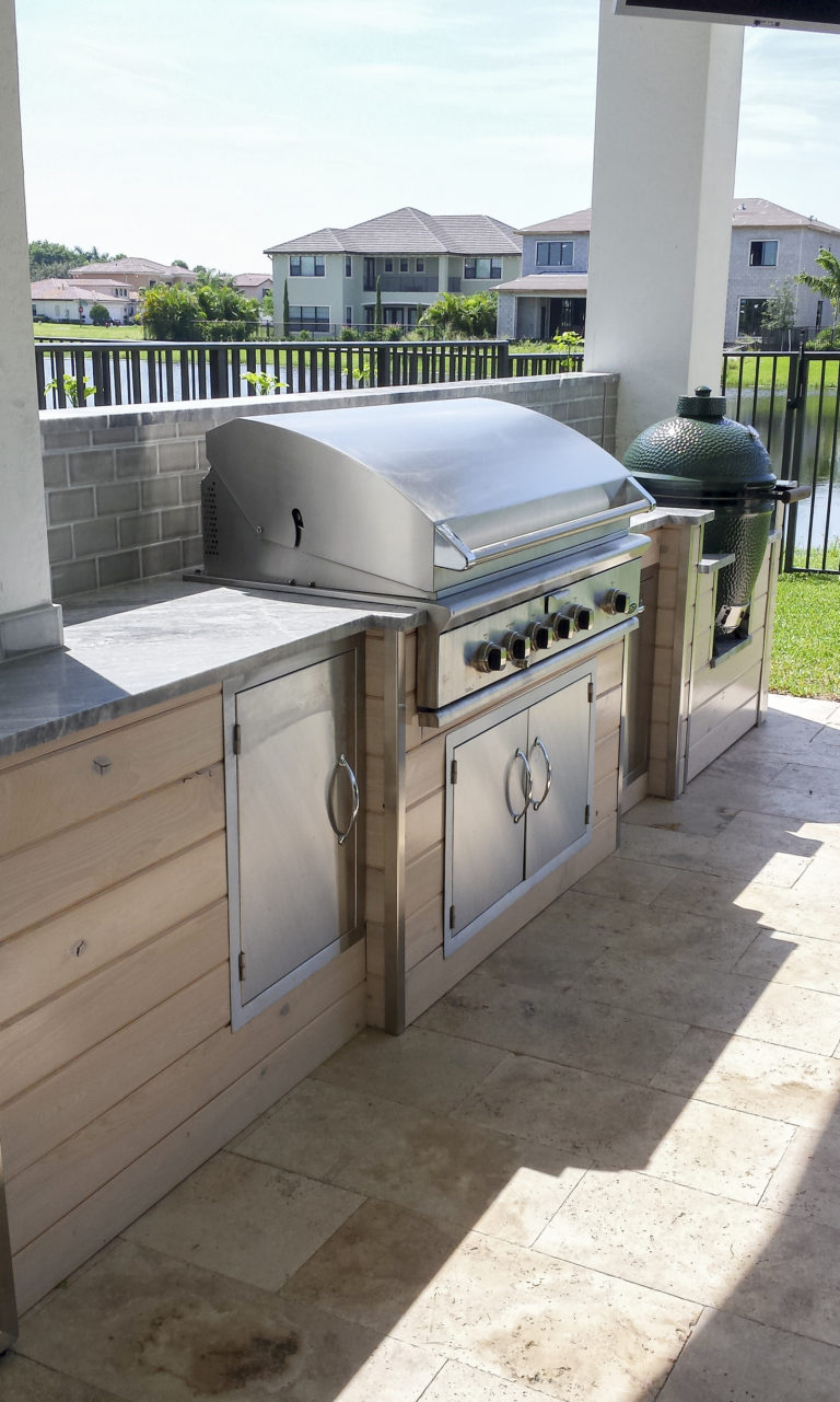 outdoor kitchen with built in grill